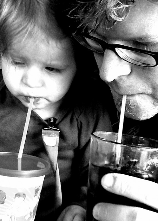 Father and Daughter Sipping Soda Pop